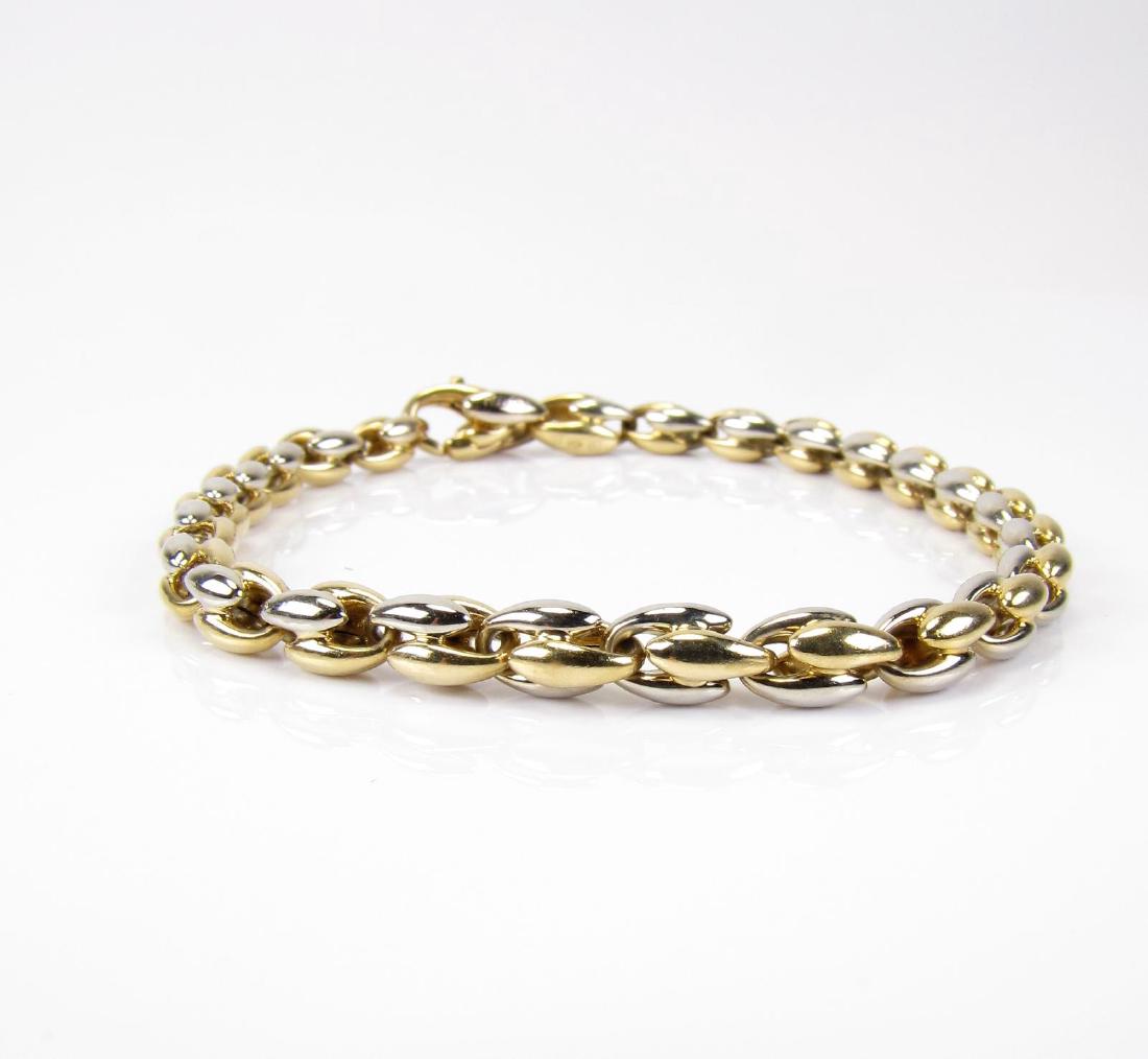 Chimento 18K Fashion Bracelet: An 18K yellow and white gold 7.5+" fashion bracelet by Italian designer Chimento, 8dwt