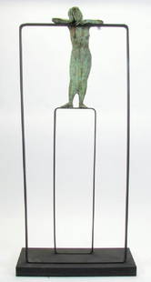 Aurora Canero Lopez, Bronze Figure on Stand: A bronze melancholy figure on stand, by Aurora Canero Lopez (Spain, b 1940), depicting a standing figure in contemplating pose, unique two piece iron stand with the bottom supporting the feet and the