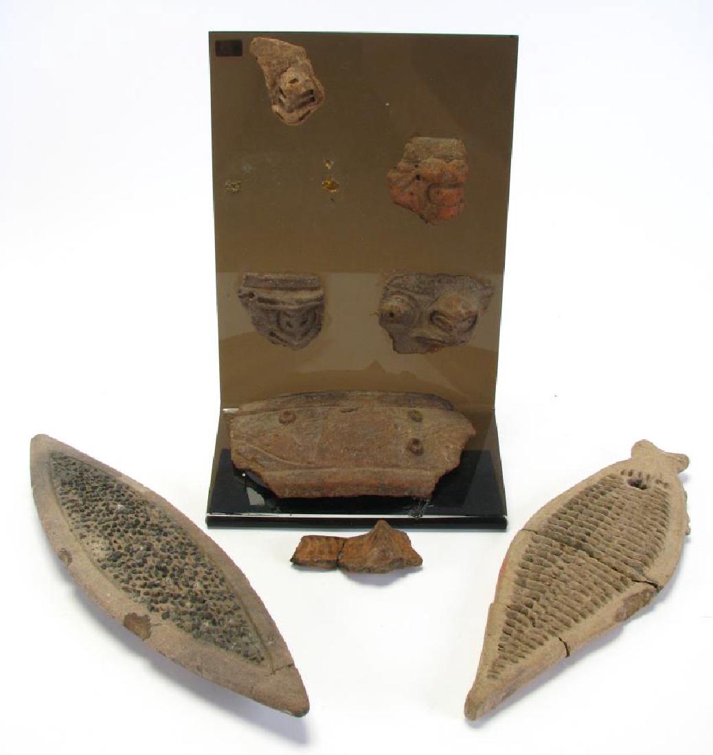 Ecuadorian Fish Graters and Clay Artifacts: Ecuadorian Fish Graters and Clay Artifacts, eight pieces total including: Pre-Columbian, Colombia, La Tolita, Tumaco, ca. 500 BCE to 500 CE coastal Ecuadorian clay fish form pottery grater (broken/rep