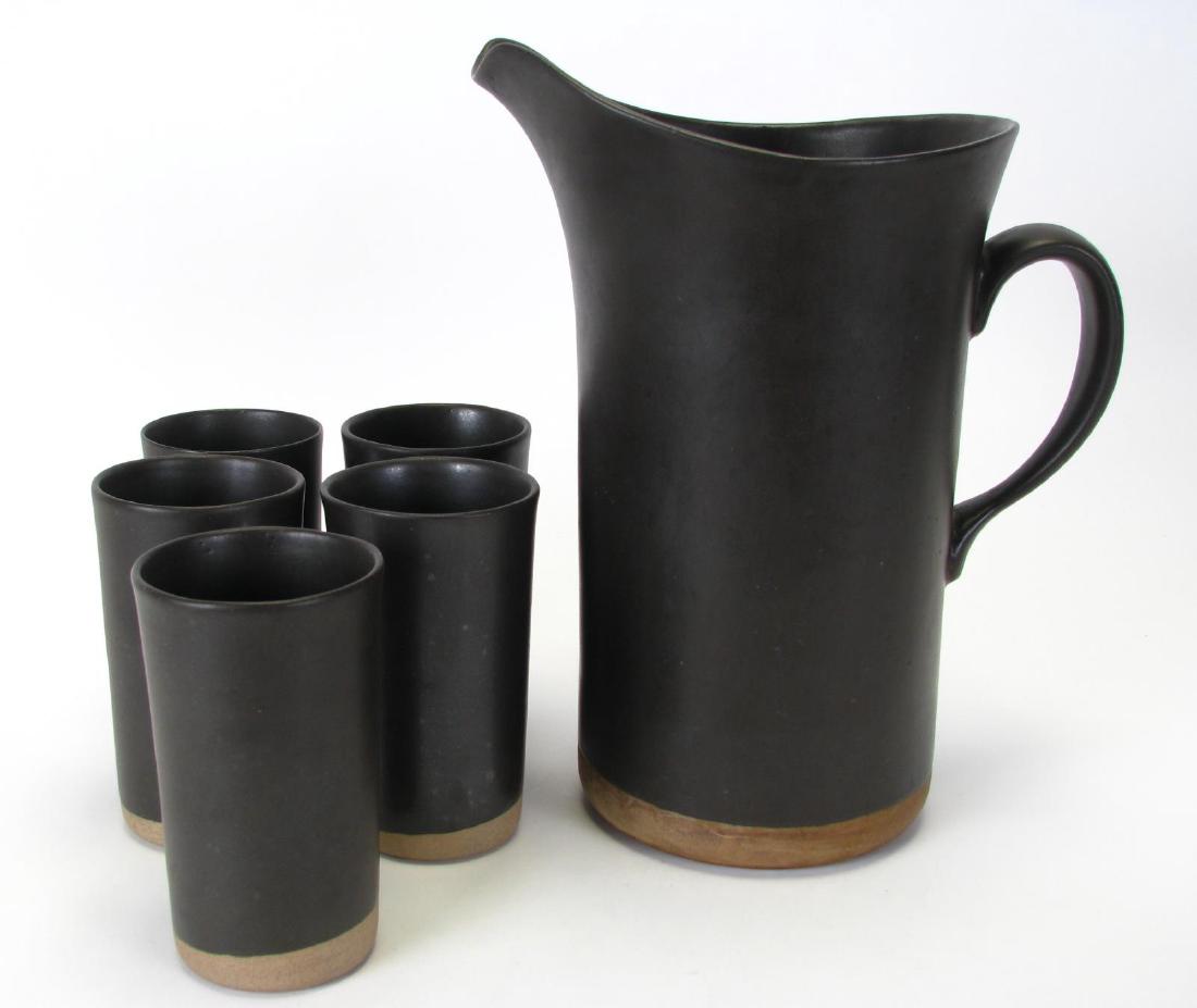 Gordon and Jane Martz Pottery Lemonade Set: Gordon and Jane Martz Pottery Lemonade Set, Marshall Studios production pitcher with charcoal brown glaze, signed "Martz, M69", set of five matching cups, all signed "Martz" on bottom, pitcher is 12.2