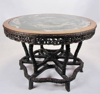 Quality, Vintage Chinese Carved Center Table: A mid 20th century vintage Chinese center table, replete with reticulated and pierced carvings, with green marble top, fine quality construction with tongue and groove and hardware-less joints, 49"dia