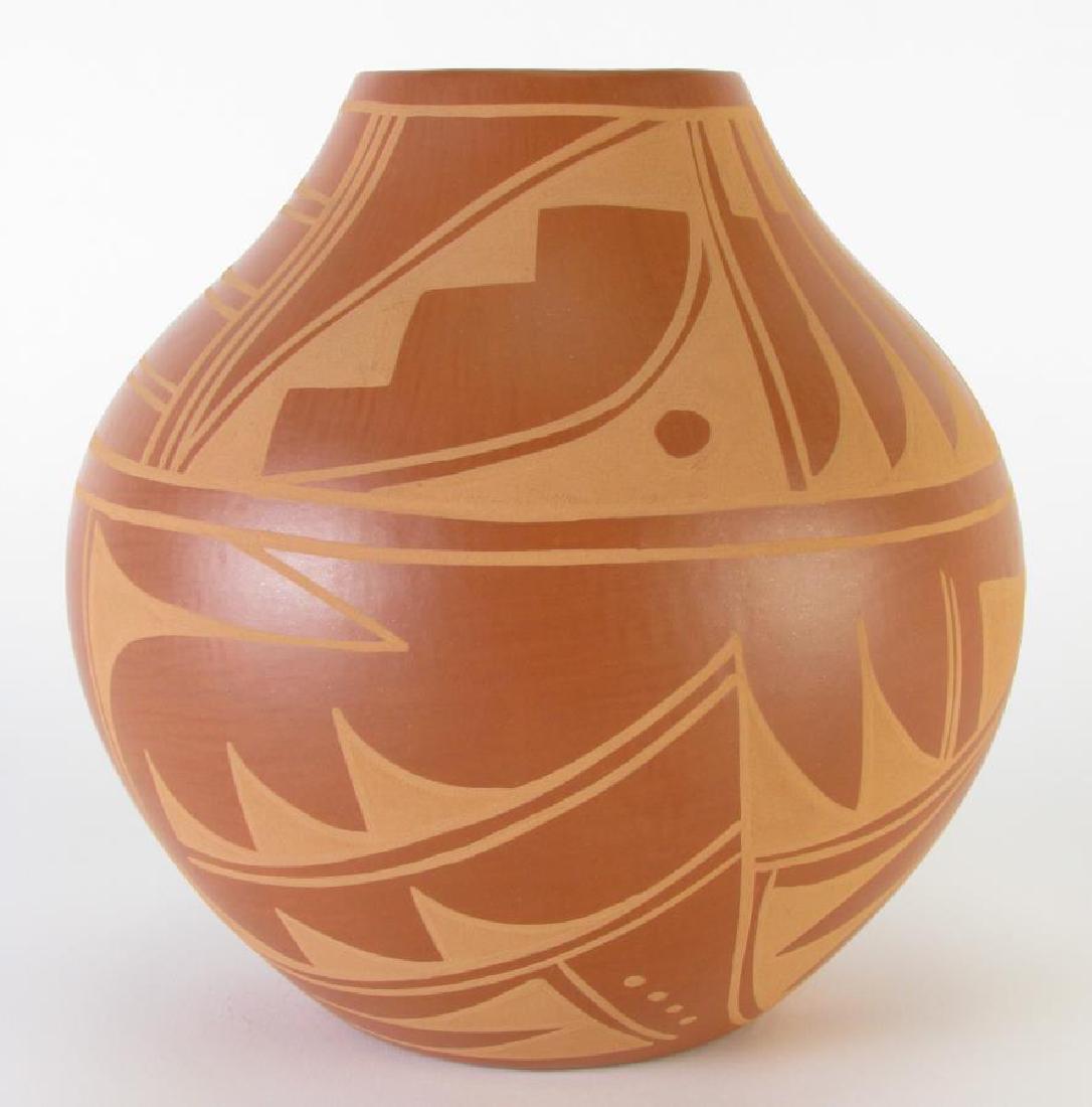 Carmelita Dunlap San Ildefonso Pottery Jar: Carmelita Dunlap San Ildefonso Pottery Jar, Handmade pottery of natural clay indigenous to the area, painted red on red terracotta tone with hand polishing using a river stone. Artist signed on bottom