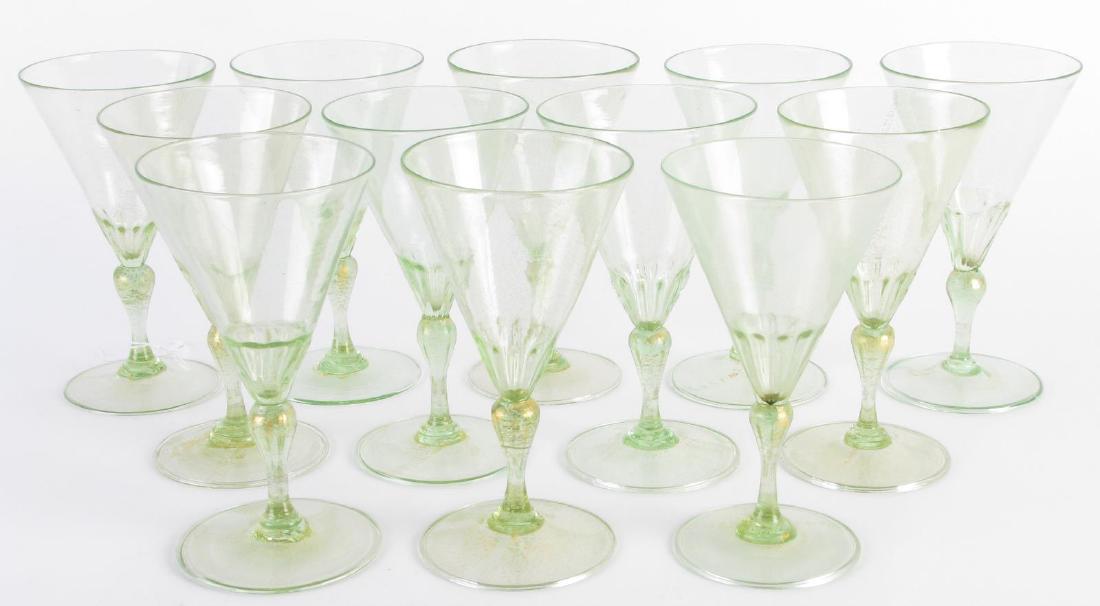 Set of Twelve Murano Green Wine Glasses: Set of Twelve Murano Green Wine Glasses, green glass with gold flake decoration, round bases, fluted cups, 6.5" high