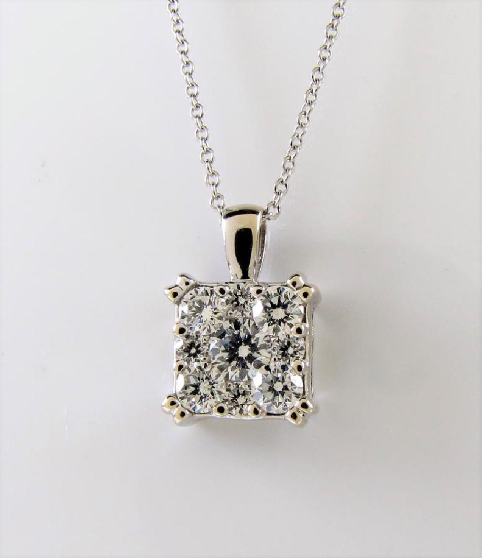 Platinum/14K Diamond Pendant and Chain: A platinum and 14K white gold pendant with nine brilliant cut white diamonds weighing .65ct, diamonds of SI clarity and H-J color and has beautiful brilliance, on a 16.5" chain