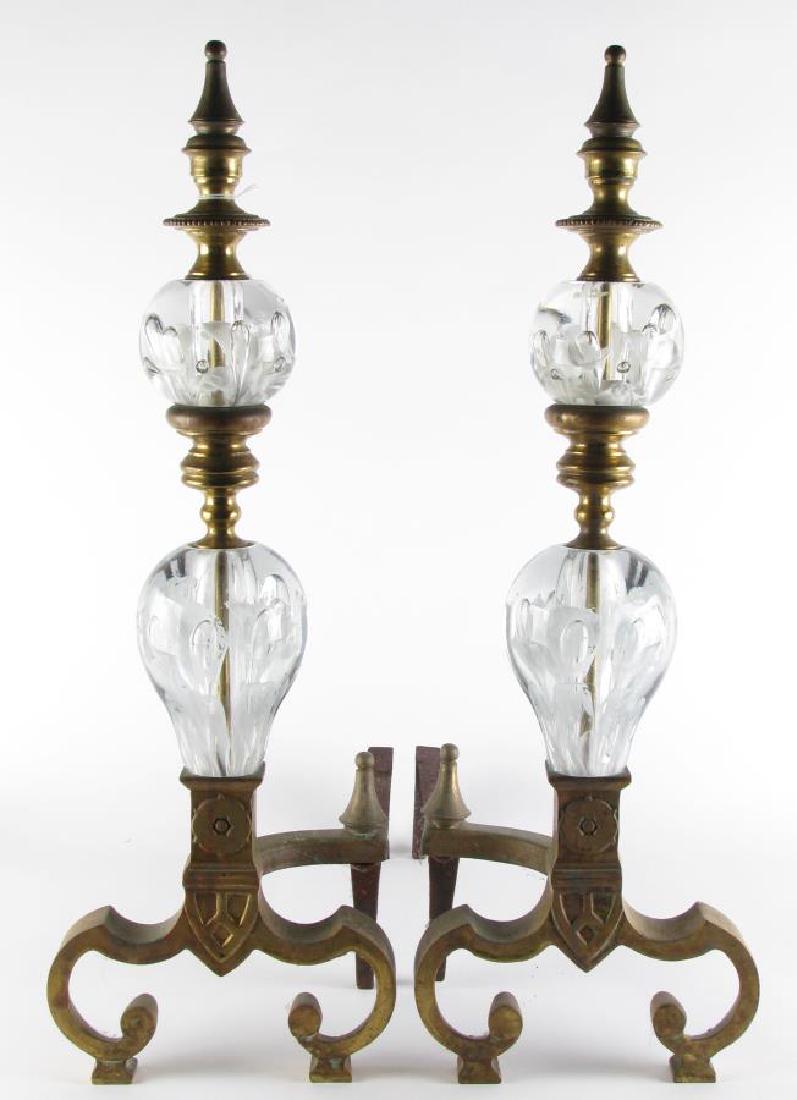 Pair of St Clair Glass and Brass Andirons: Pair of St Clair Glass and Brass Andirons, each having two clear glass paperweights with white floral and suspended bubble decoration, brass bases and finials, 22.75" high