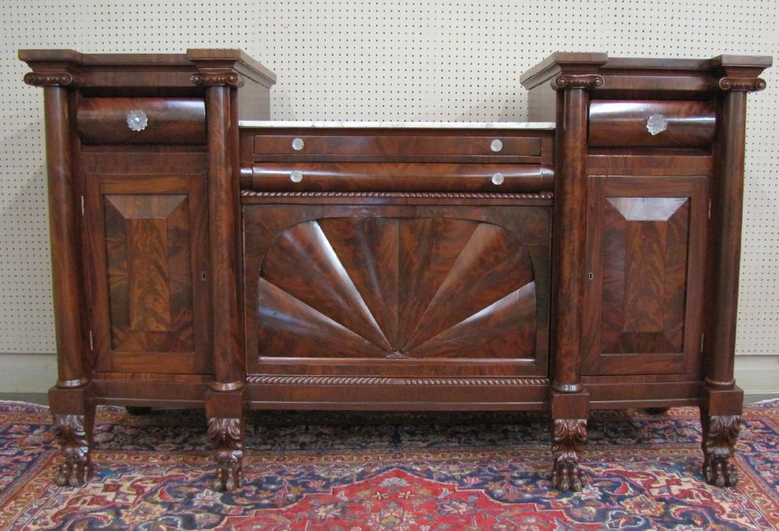 Impressive Antique French Empire Sideboard: A late 19th century, French Empire style mahogany sideboard, with marble insert (repaired), glass pulls (one dmgd), two drawers and one sliding door, cabinet doors and two drawers on each end (tops ar