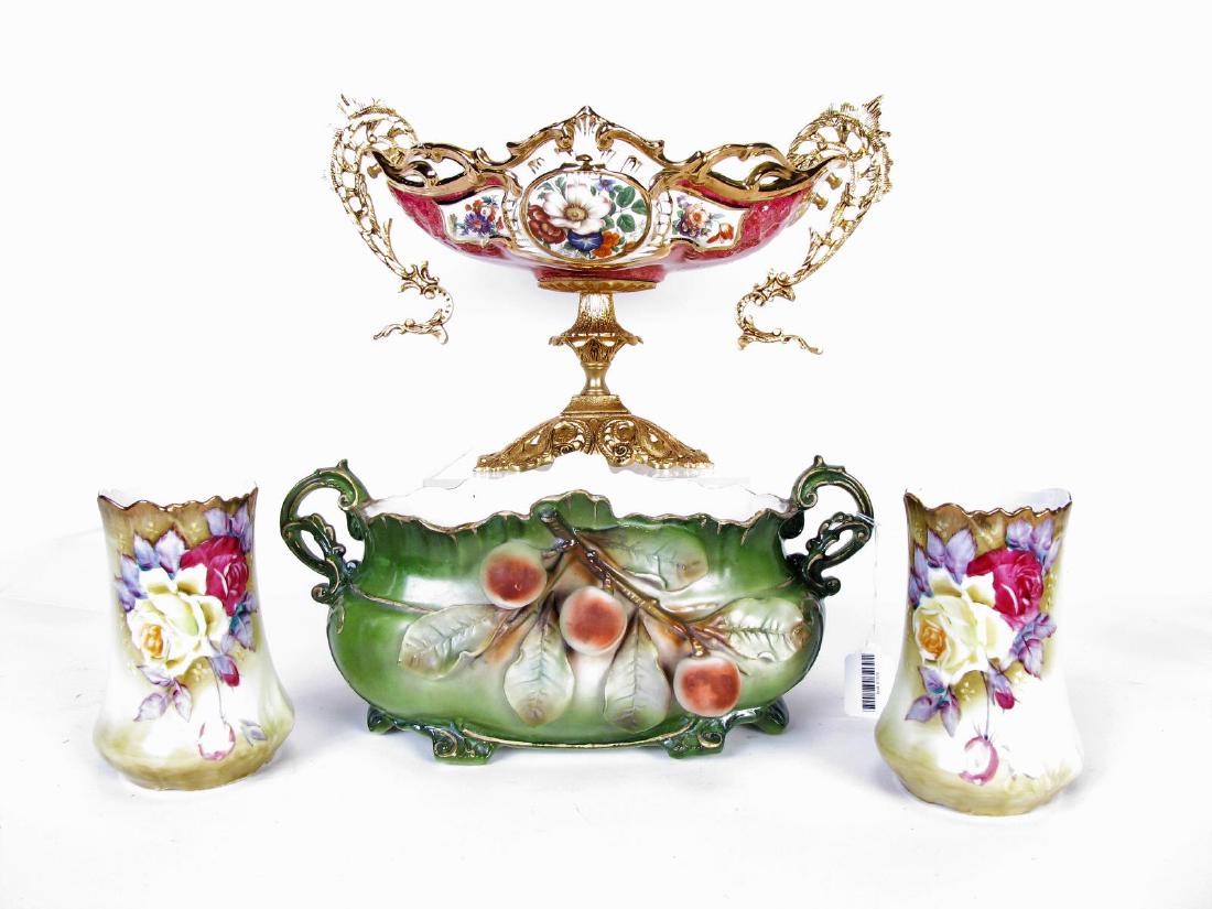 Group of Decorated Porcelain: Group of Decorated Porcelain, four total including: porcelain and brass compote, mounted brass handles, floral and gold decoration, pierced brass base; pair of Nippon vases with yellow and red rose de