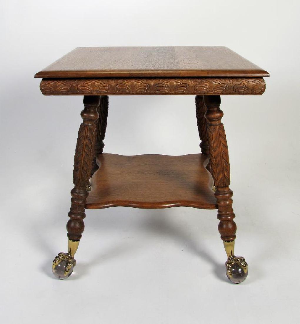 Antique Glass Ball and Claw Lamp Table: An antique oak lamp table, with glass ball and claw foot, 27.5 x 27.5 x 30"h
