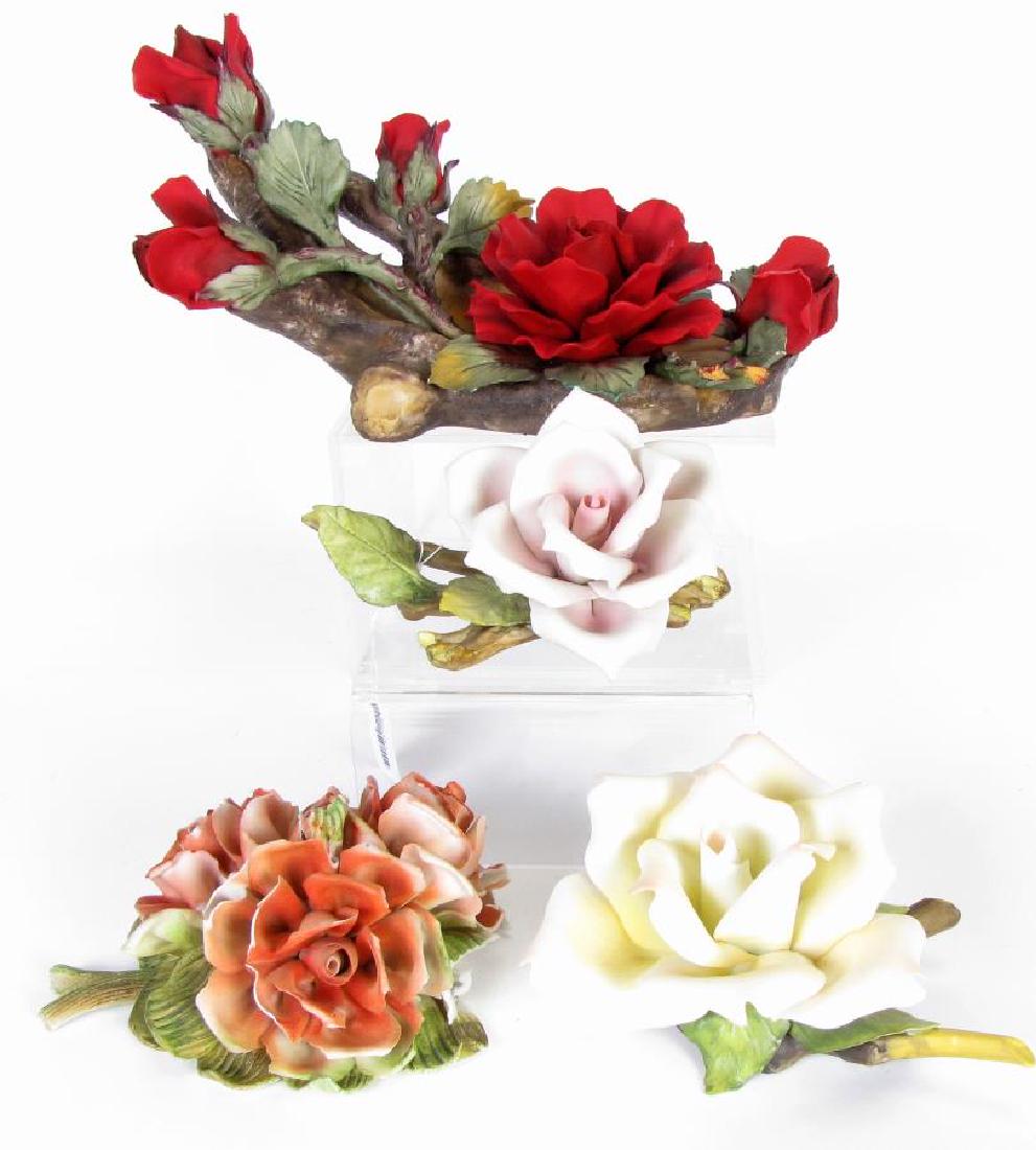 Group of Porcelain Flowers: Group of Porcelain Flowers, four total including: Capodimonte red rose grouping with branch and leaf decoration, hallmarked on underside; yellow rose with pink accents; white rose with pink accents; l