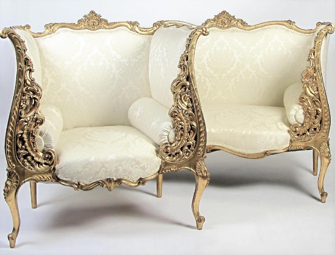 French Settee and Chair: An antique French settee and chair, with carved gold-leaf frames, damask ivory upholstery, 58"l (settee)