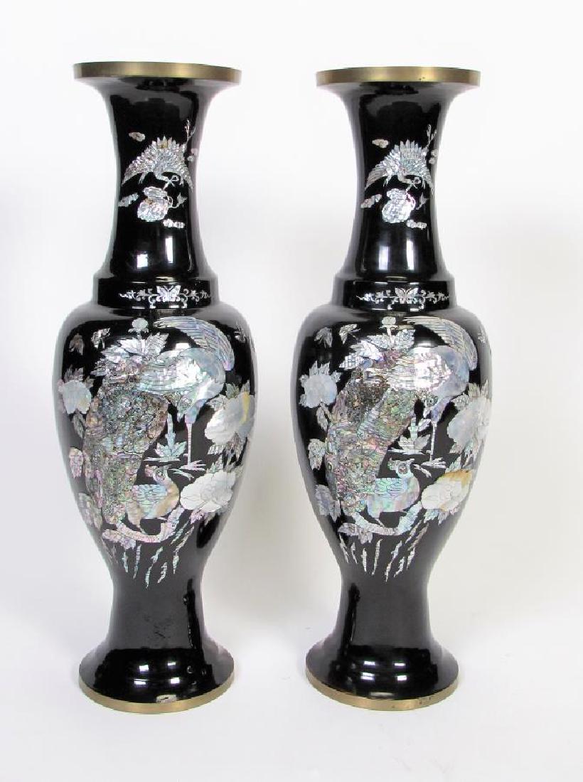 Pair of Copper Oriental Floor Vases: A pair of copper Oriental floor vases, black lacquer vases with applied abalone and mother-of-pearl bird and floral decoration, 28" high