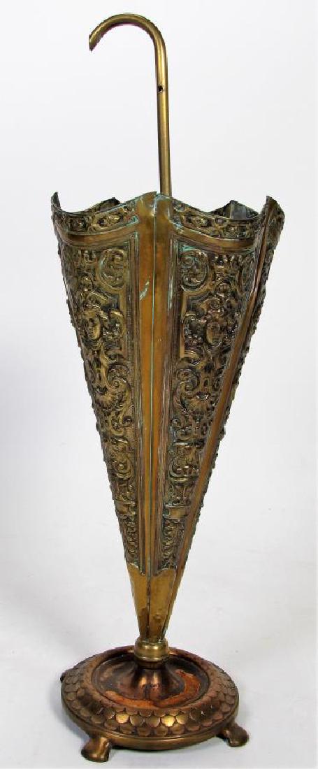 Vintage Cast Metal Umbrella stand: A vintage cast metal umbrella stand, six-sided, correct patina, (some damage) 11.5"dia x 35"h