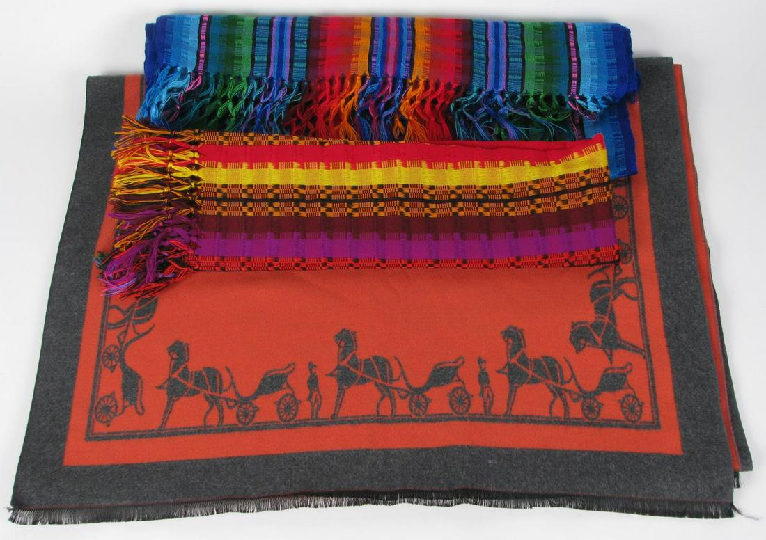 Three Scarves Including Designer Cashmere: Three scarves including a nice, designer cashmere (tag missing, unsigned) with border depiction of horse and carriage in charcoal and sienna colors