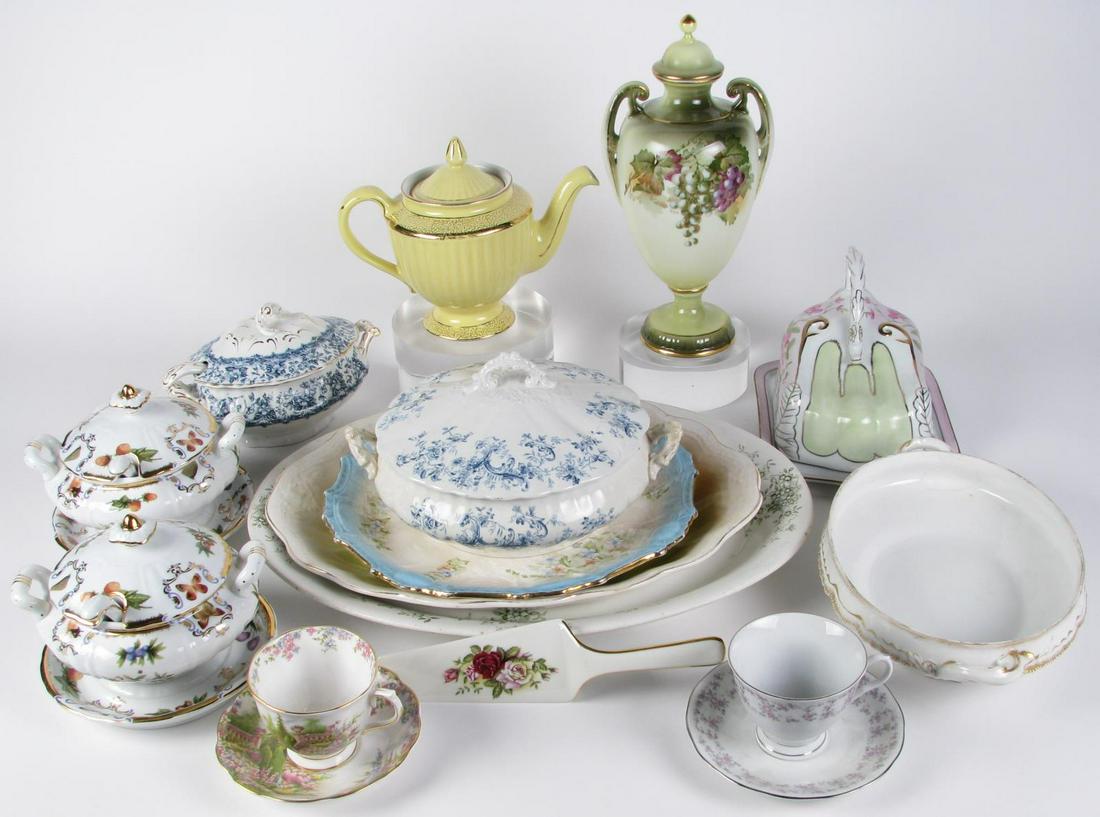 Fifteen Decorated Porcelain Items: Fifteen decorated porcelain items including a pair of I. Godinger & Co. soup tureens with ladles; a Royal Albert cup and saucer; a floral decorated cup and saucer; a cheese dome; a Theodore Haviland L
