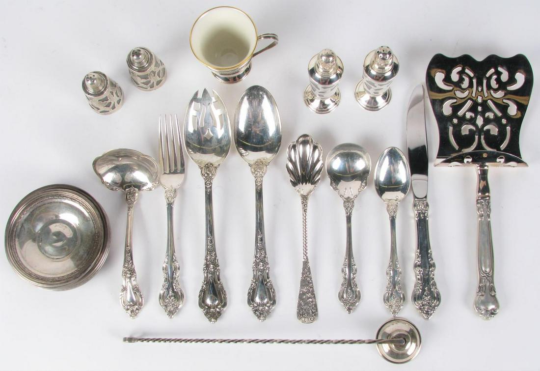 Collection of Sterling Flatware and Tableware: Collection of Sterling Flatware and Tableware, 65 pieces total including: (14) pierced demitasse cups with Lenox porcelain inserts; (4) glass salt and pepper shakers with sterling overlay; (3) sterlin