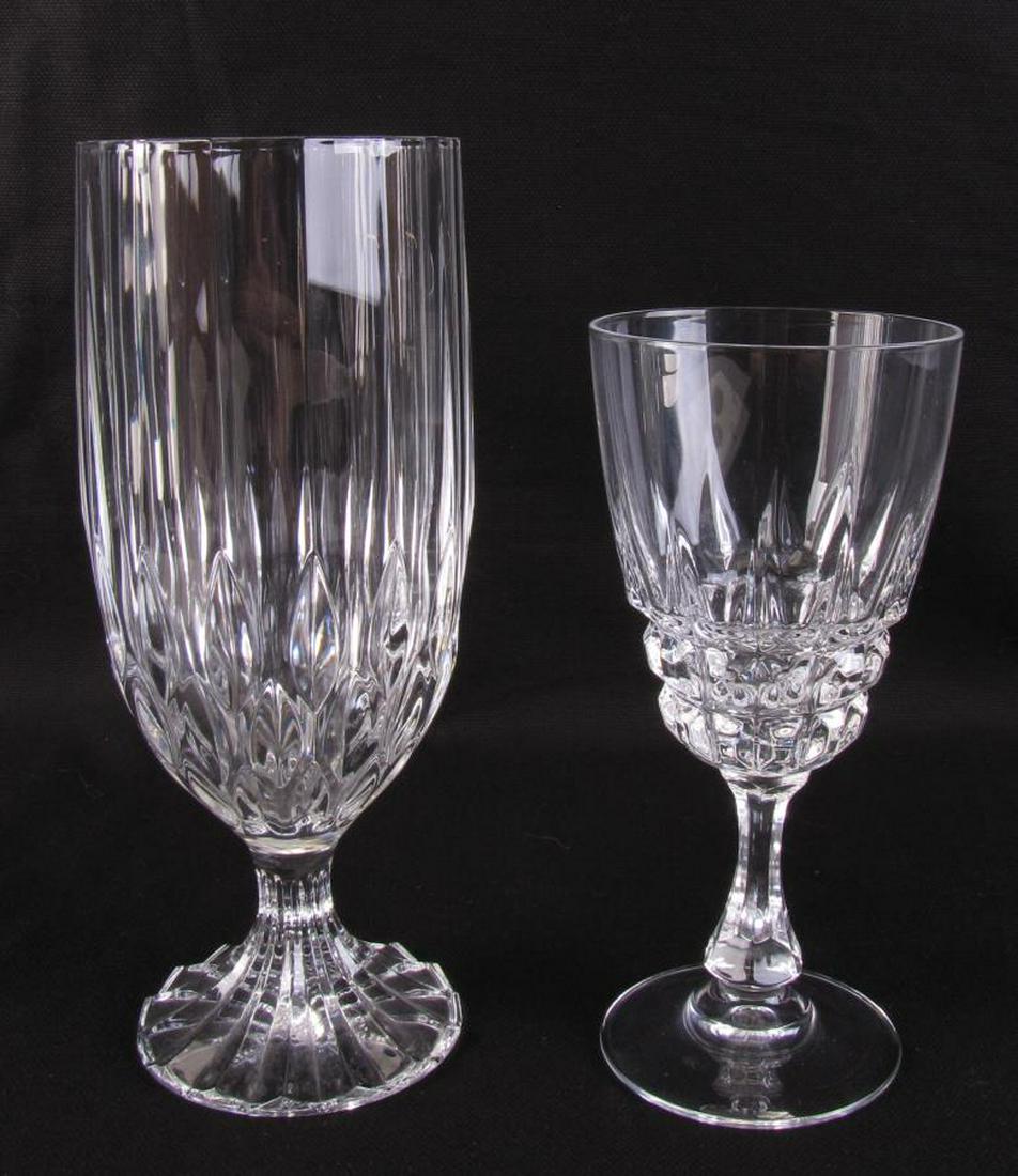 Two Sets of Crystal Stemware: Ten crystal stemware items including four iced tea with cut foot design, and six white wine with faceted stems, all unsigned, 6" and 7.5"