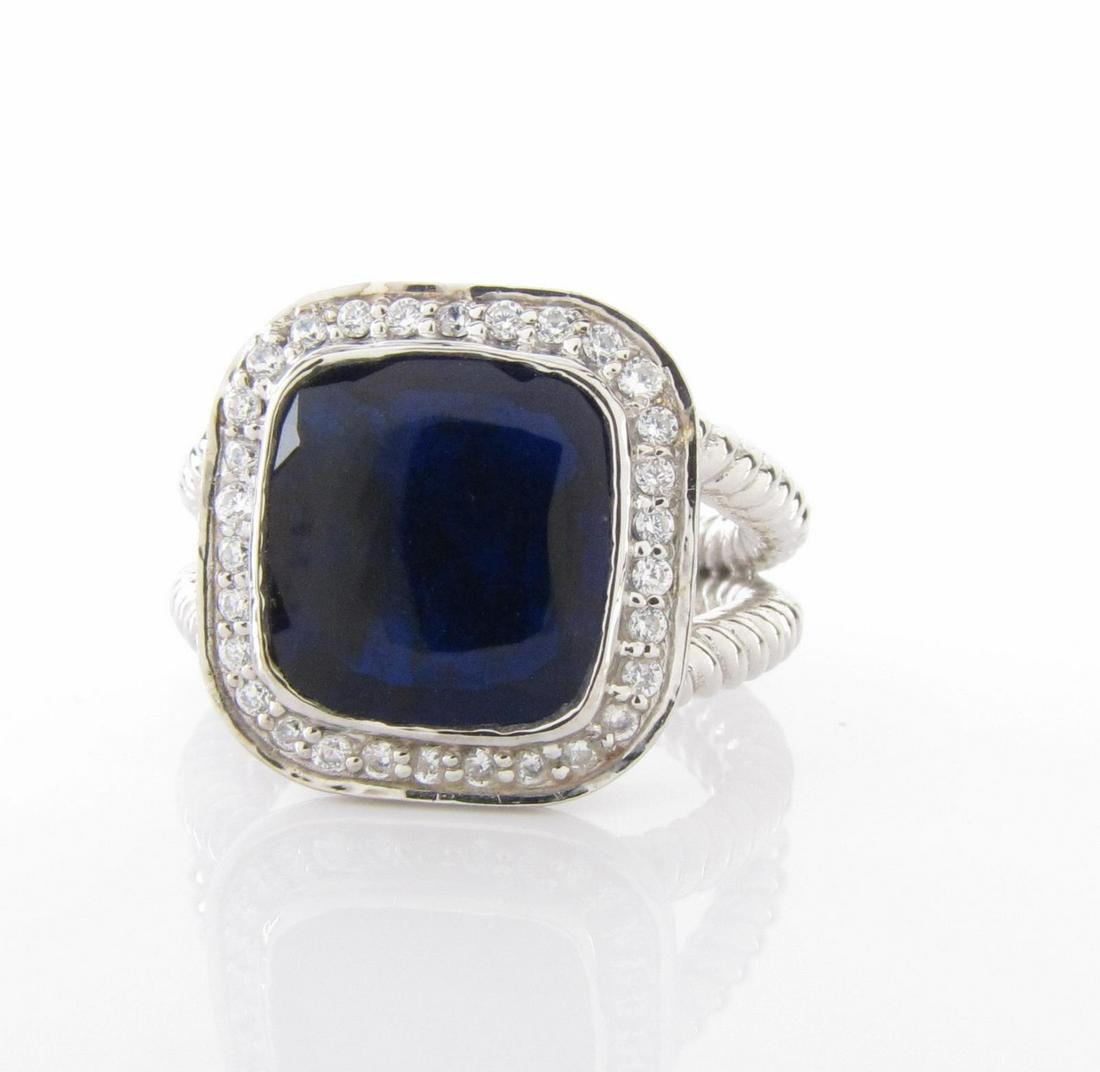 David Yurman Sterling Blue Lapis Albion Ring: A David Yurman Albion ring in sterling silver with lapis blue center stone and diamond bezel, size 9.75