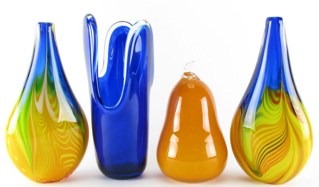 Four Art Glass Items, Vases, Figure: A group of art glass items including a pair of bottle form vases with cobalt glass necks, red, yellow and orange glass decorated bodies and narrow top openings; a freeform cobalt vase with clear glass