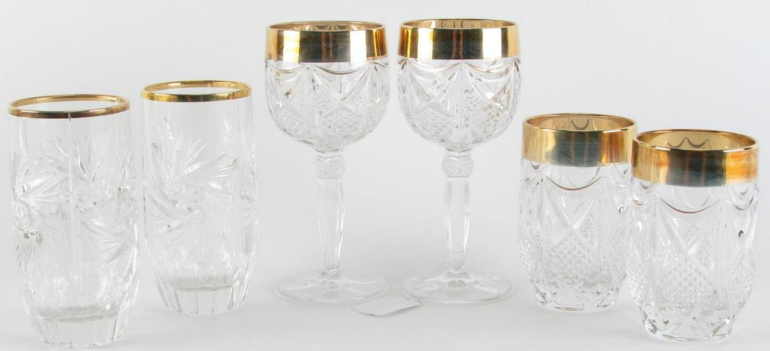 Thirty-Three Gold Rim Glasses: Three sets of gold rim glassware including (8) heavy gold rimmed red wine stems; (13) heavy gold rimmed rocks glasses; and (12) gold rimmed tumblers; 4.5-6.75" high