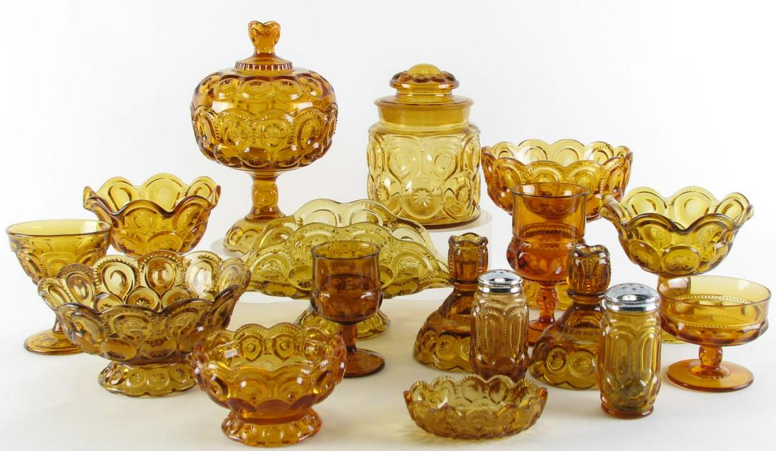 Fifty-One Pieces of Amber Pattern Glass: Fifty-One Pieces of Amber Pattern Glass including (2) lidded compotes; (9) compotes; (14) wine glasses; (7) dessert wine glasses; (4) candlesticks; (7) sherbets; (1) salt and pepper set; (1) oval nut 