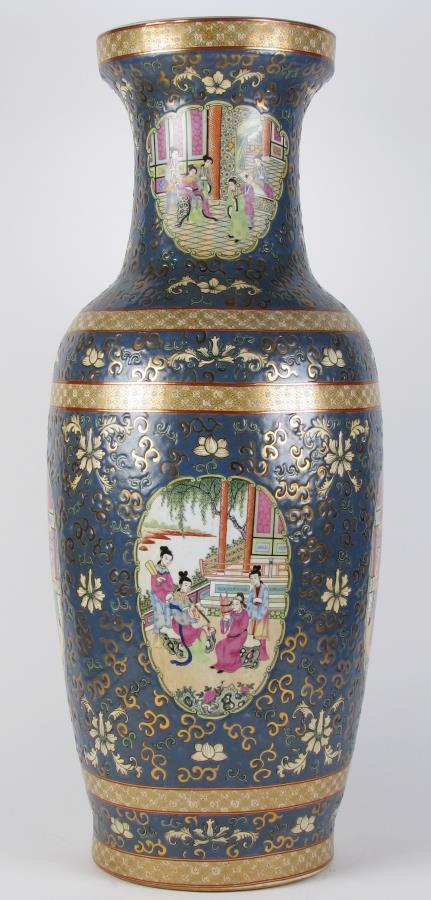 Oriental Porcelain Floor Vase: An Oriental porcelain floor vase, blue ground with medallions depicting garden and interior figural scenes, cream and green floral decoration, Oriental characters on underside, 30.25" high