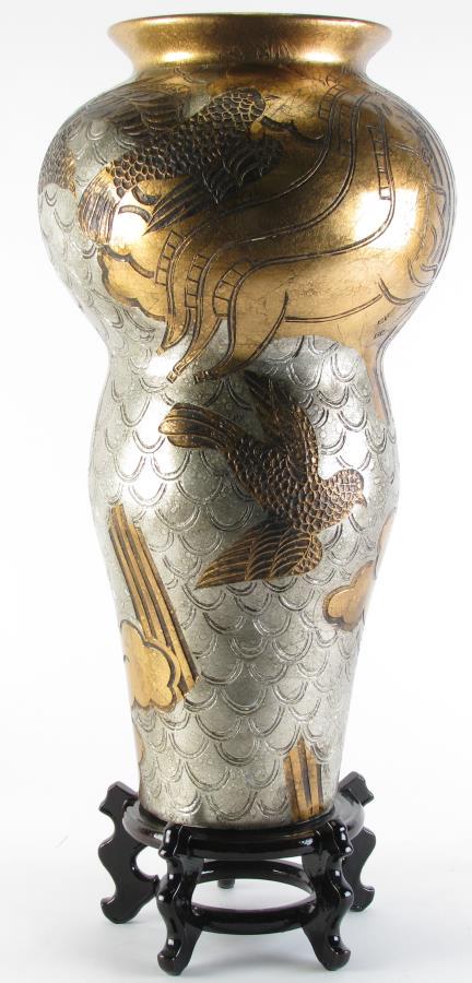 Oriental Pottery Floor Vase: An Oriental pottery floor lobed vase with copper and silver color bird and horse decoration, carved geometric shapes, on carved wood stand, 21.5" high
