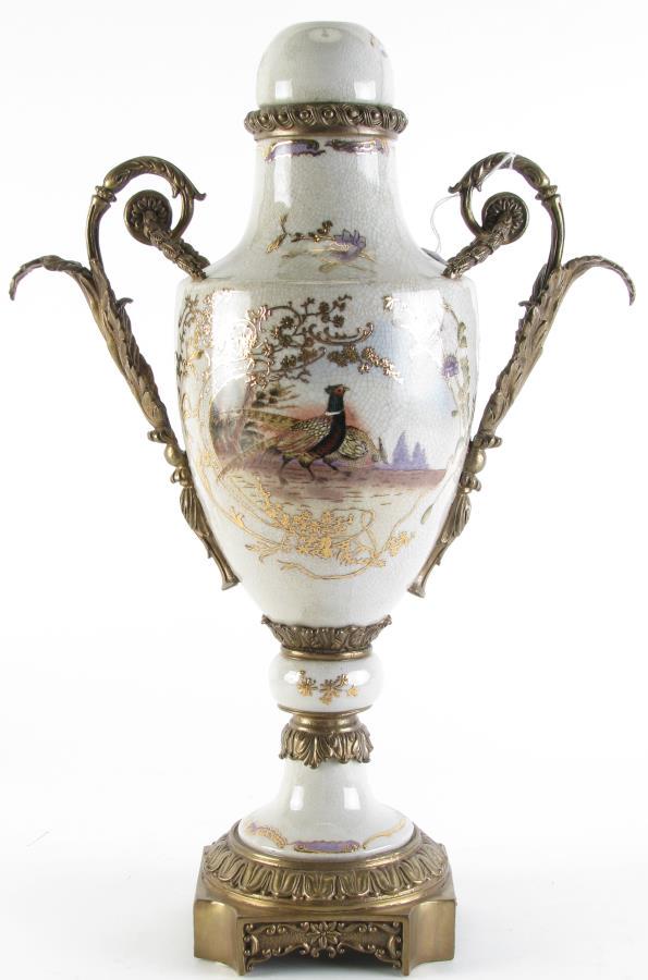 White Porcelain Lidded Urn: White porcelain urn with craquelure ground, decorated with hand painted pheasants, gold and lavender enameled decoration, cast metal mounted handles, lidded (missing finial), on cast metal base, hallm