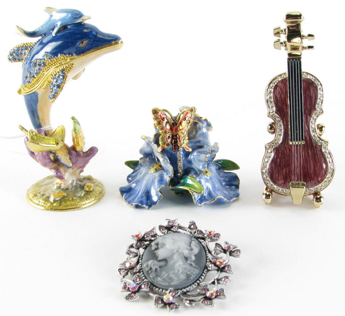 Three Enameled Dresser Boxes and Brooch: Three Enameled Dresser Boxes and Brooch, violin form box with lavender enameling and rhinestone decoration; dolphin box with blue enameling with fish and stingray decoration; Iris flower box with blue