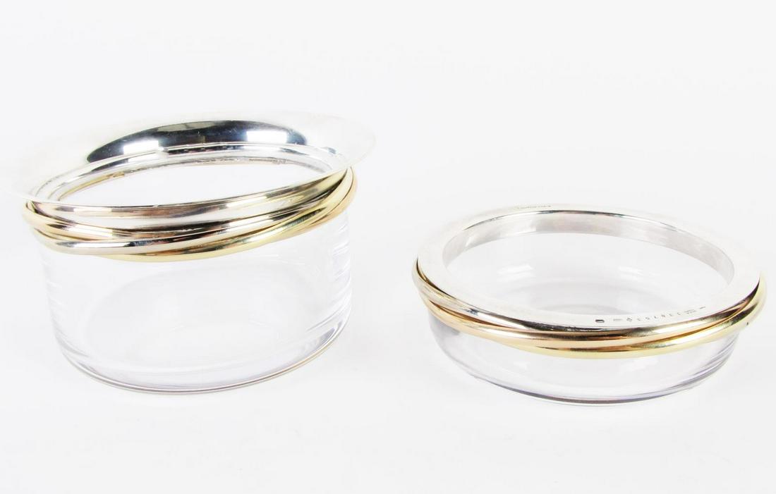 Two, Signed Cartier Caviar Bowls: Two, Cartier caviar bowls, both are glass with sterling silver rim, both hallmarked, numbered and with Cartier logo on rim, larger bowl is 4.5 x 2.5", second is 4 x 1"