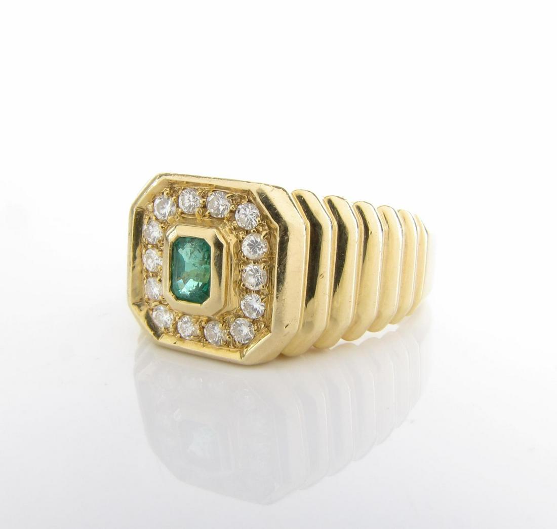 14K Yellow Gold Gent's Emerald, Diamond Ring: 14K yellow gold gentleman's ring featuring a center emerald cut emerald, approximately .25ct, and fourteen round brilliant cut diamonds, direct set, surrounding center bezel set emerald; total diamond