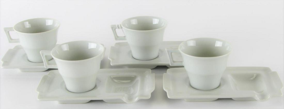 Set of Four Theodore Haviland Cups and Saucer/Tray: Set of Four Theodore Haviland Cups and Saucer/Tray, four celadon demitasse cups, four celadon fitted saucers and ash receivers, all hallmarked "Theodore Haviland" on underside, saucers are 5.75" x 3.2