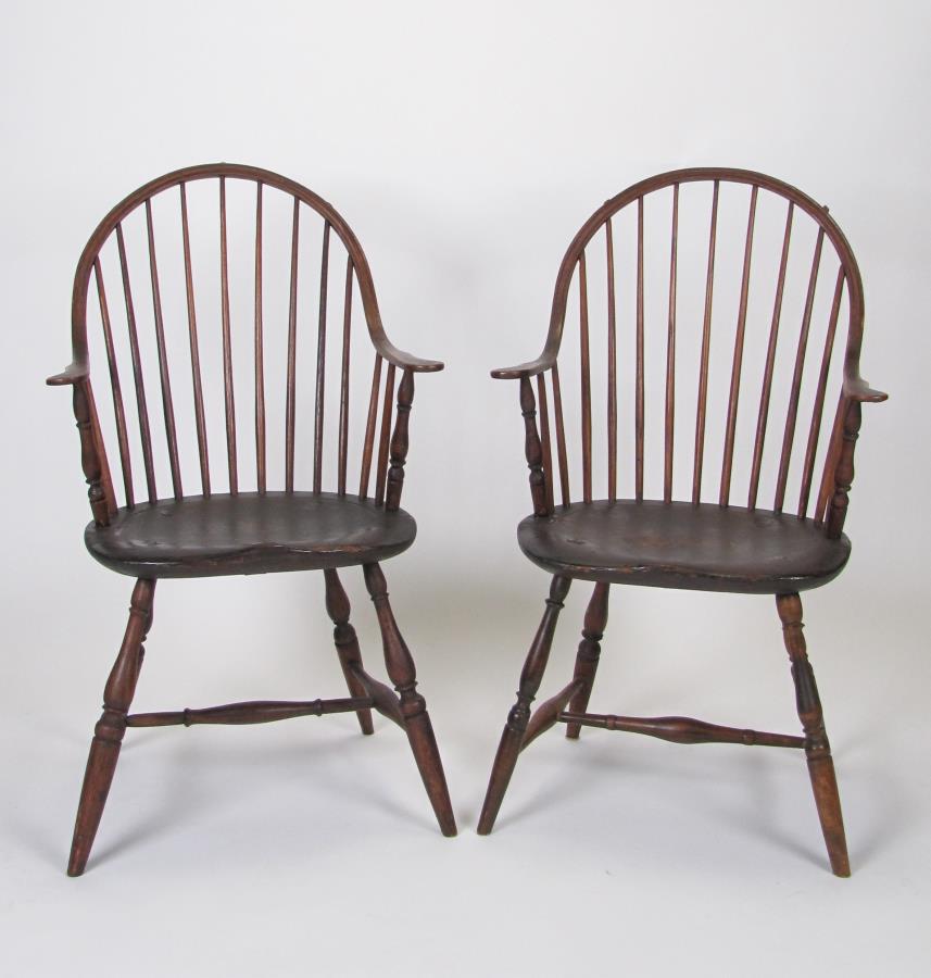 Pair of 18th Cent Windsor Sackback Arm Chairs: A pair of 18th century Windsor sackback arm chairs, evidence of old paint, vase and ring arm support, saddle seat, seat 17.5"h, overall 39"h, possibly Connecticut