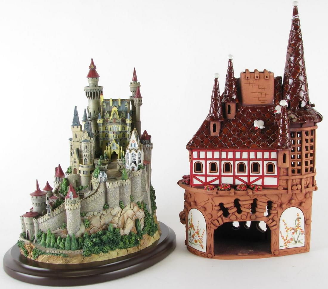 Two Decorative Castles: Two Decorative Castles, Lenox "Falkenstein' composite castle, ca. 1996, on oval base; pottery castle with inlaid porcelain floral decorated panels and hand painted decoration; 10.5" and 13" high