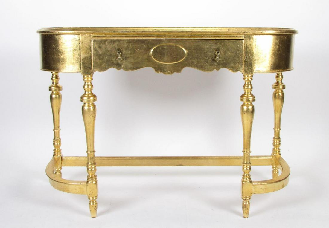 Peter Klerner Gold Leaf Console Table: A Peter Klerner Furniture Co. console table, with gold leaf finish, 1 drawer, on turned legs, 20th century, 45 x 17 x 30.5"h. Peter Klerner was a New Albany, IN based furniture maker in the early to m