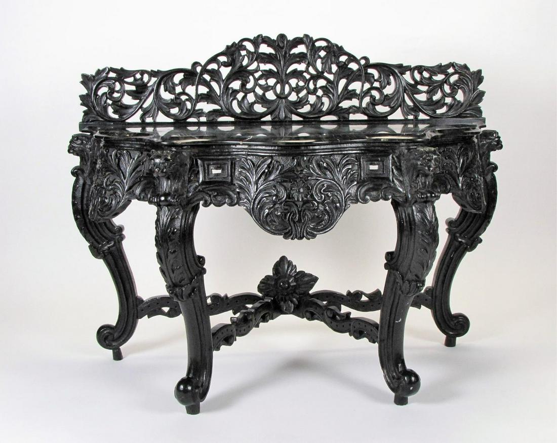 Ornately Carved Marble Top Console: An ornate console table, with lion motif and floral pierced carvings, floral carved gallery on back, with marble top, ca late 20th century, 53 x 23 x 40"h