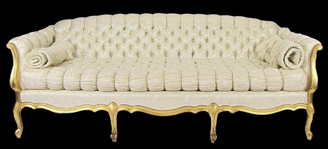 Upholstered Formal Sofa: A formal, period-style transitional sofa, with gold leaf carved French frame, and button tufted tone-on-tone custom cream color upholstery by Coffey's Custom Upholstery Mfg, New Albany, IN, with accen