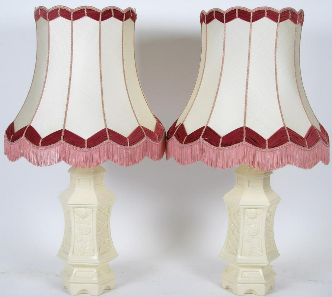 Pair of Painted Plaster Table Lamps: Pair of Painted Plaster Table Lamps, single light lamps with floral and cream plaster bodies, cream silk shades with red velour and silk tassel decoration. 39" high