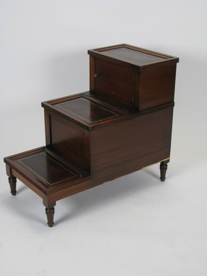 Vintage Mahogany Library Step: A vintage mahogany library step, two storage compartments, tooled leather insert tops, ca 1940s (slight veneer damage on one corner), 31 x 17 x 27"h