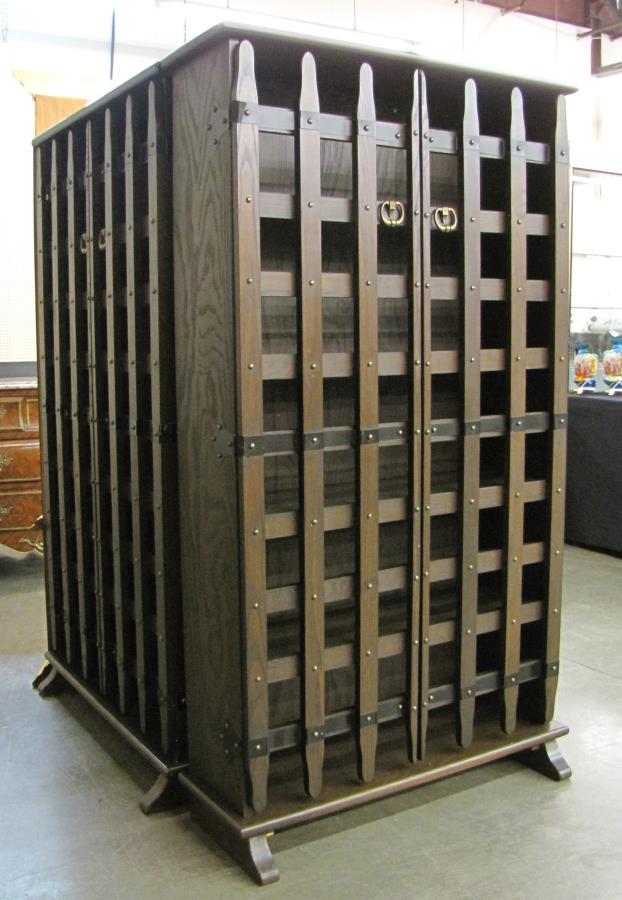 Set of Three Bookcases: A set of three bookcases, transitional Gothic design, slat and cast metal doors, nailhead decoration, ca mid/late 20th century, 36 x 11 x 64.5"h