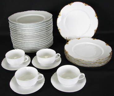 Group of Haviland "Ranson" China, 29 pieces: Group of Haviland "Ranson" China, 29 pieces total including: set of 16 white plates; set of five white plates with gold trim; set of four white cups and saucers; plates are 9.75" diameter