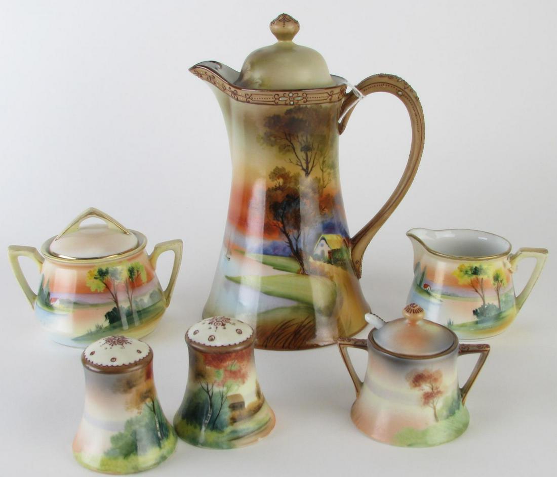 Nippon Hand Painted Porcelain Coffee Service: Nippon Hand Painted Porcelain Coffee Service, six total including: coffee pot; creamer; lidded sugar; salt and pepper shakers; lidded jelly jar with spoon; 2.75"-9" high
