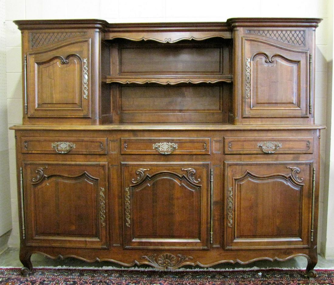 Vintage French Sideboard: A French oak sideboard, carved raised panel doors, 2 piece construction, hutch top has two doors and open shelf in center, base has parquet inlaid top and 3 cupboard doors and 3 drawers, ca early/mid 