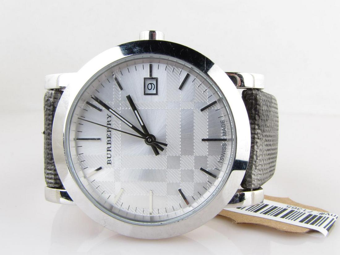 Burberry BU1869 Stainless Wristwatch: A Burberry BU 1869 Stainless steel fashion wristwatch with silver-gray geometric plaid design textured dial, stainless markers and hands with white luminous markers on hands, second hand, date at 3 o'