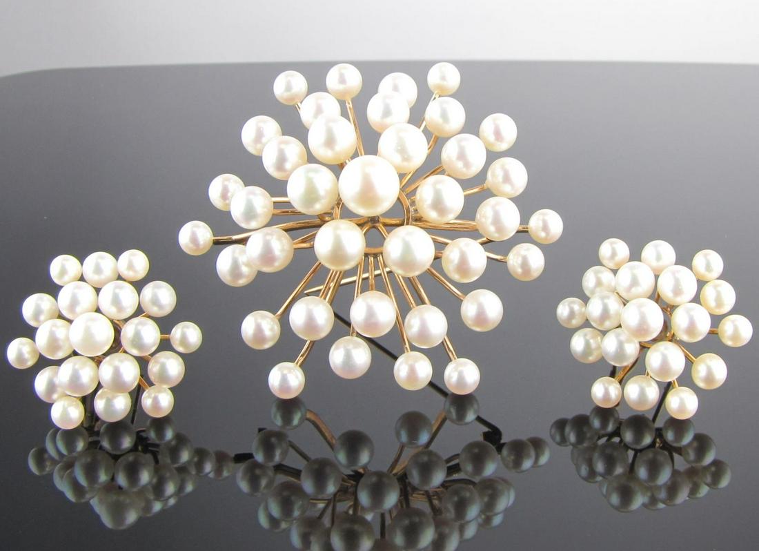 Vintage Pearl Brooch and Earrings: A vintage spray motif pearl brooch, and a pair of matching earrings with French backs, with graduated size cultured pearls on gold filled frames and backs, with vintage Willis Jewelers, Minneapolis, M
