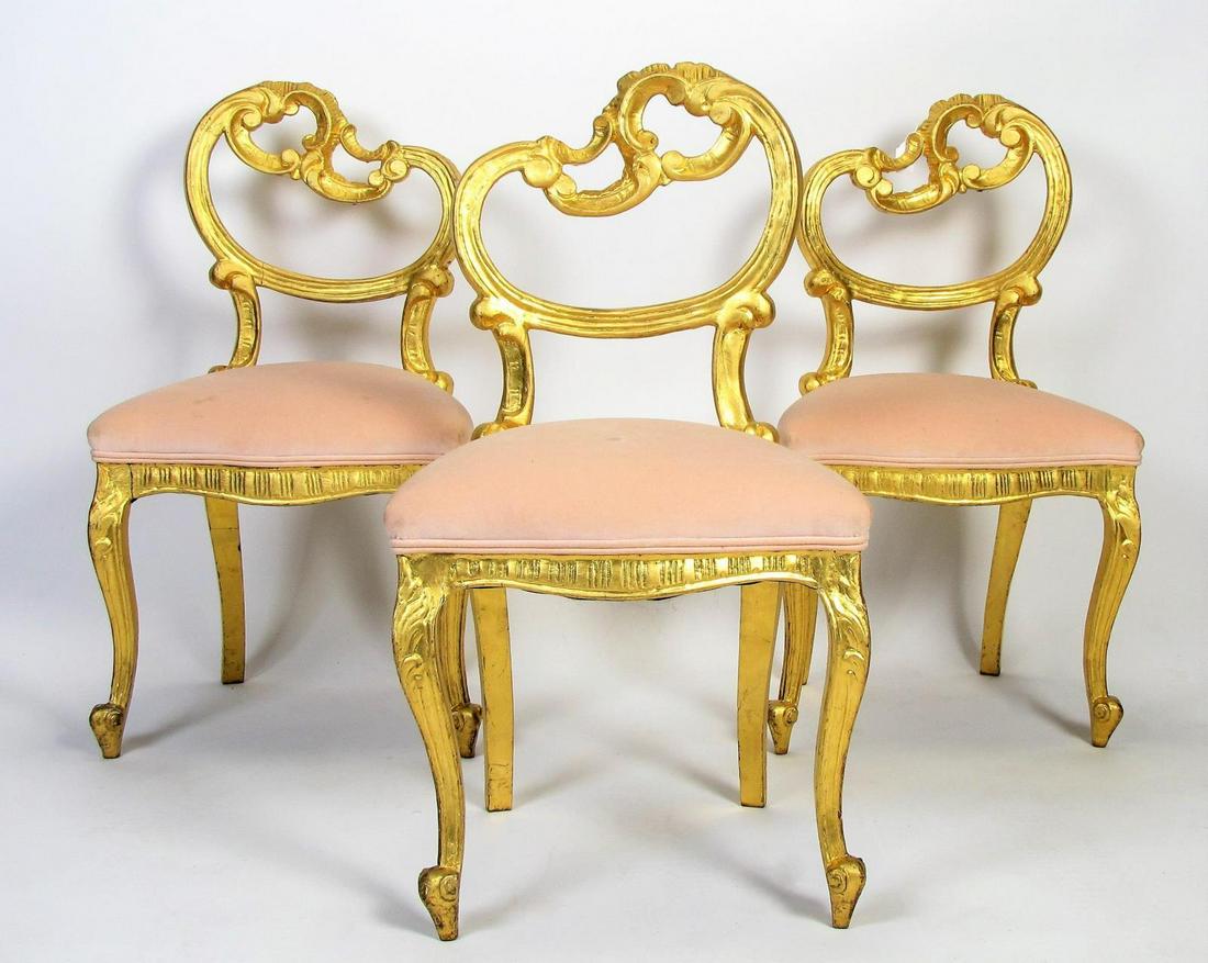 Three French Side Chairs: A set of three, antique French side chairs, with gold leaf on carved and gesso frames, velour upholstered seats (would benefit from tightening of frames)