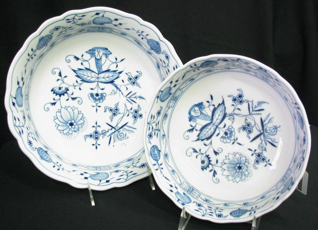 Two Meissen Blue Onion Serving Bowls: Two Meissen Blue Onion serving bowls including 8.5" diameter x 3" high with early 20th century mark with two slashes (second); and an 11" x 3.5" high bowl with early 20th century crossed swords mark a