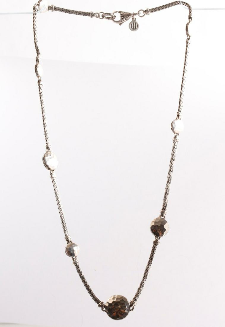 John Hardy Palu Sautoir Necklace: A sterling silver John Hardy, Palu Collection, Sautoir disc station necklace, 17" long, lobster claw clasp, with hammered silver discs