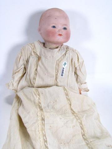 Armand Marseille Kiddiejoy Bisque Head Baby Doll: Armand Marseille Kiddiejoy bisque head baby doll with glass open/close eyes, circa 1926, with cloth body and feet, resin hands, noise maker in body (not functioning), in baby Christening gown, overall