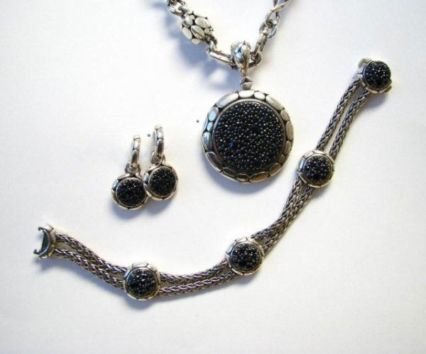 John Hardy Necklace, Bracelet and Earrings: John Hardy Sterling and Black Sapphire Jewelry grouping including Four Circle Station Bracelet, Round Pendant (1.375" diameter) on chain, and pair of round hoop drop earrings