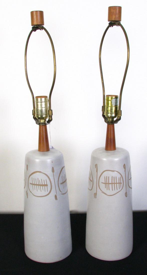 Pair of MCM Gordon and Jane Martz Table Lamps: Pair of MCM Gordon and Jane Martz table lamps, mid-century modern, glazed stoneware, made in Veedersburg, IN; both signed and with original wooden finials. Overall height 25". Includes matching pair o
